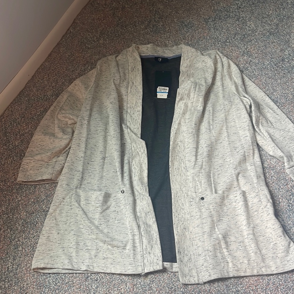 Cardigan. New with tags. Size XL.